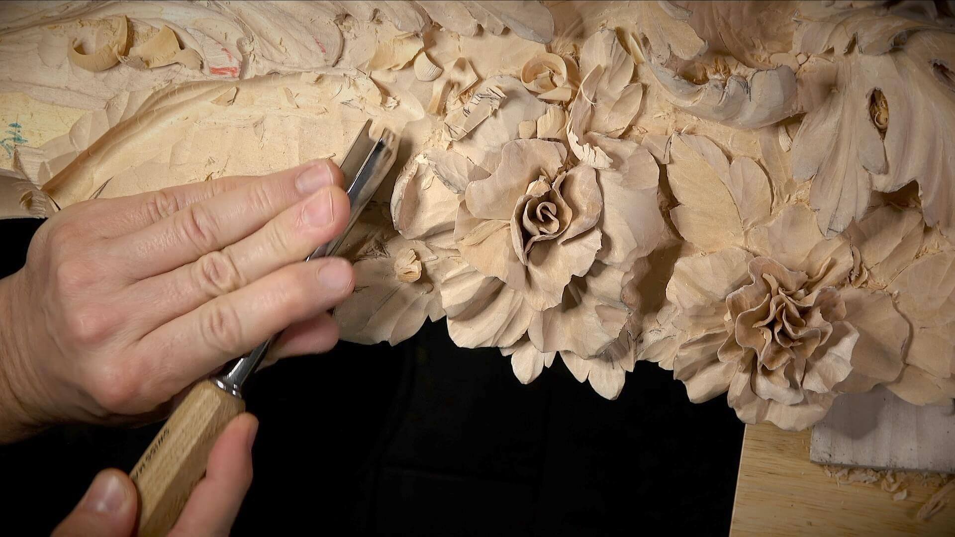 WOODCARVING LESSONS: Woodcarver Grabovetskiy uses a chisel to carve detailed flower designs into wood. - Wood Carving tutorials