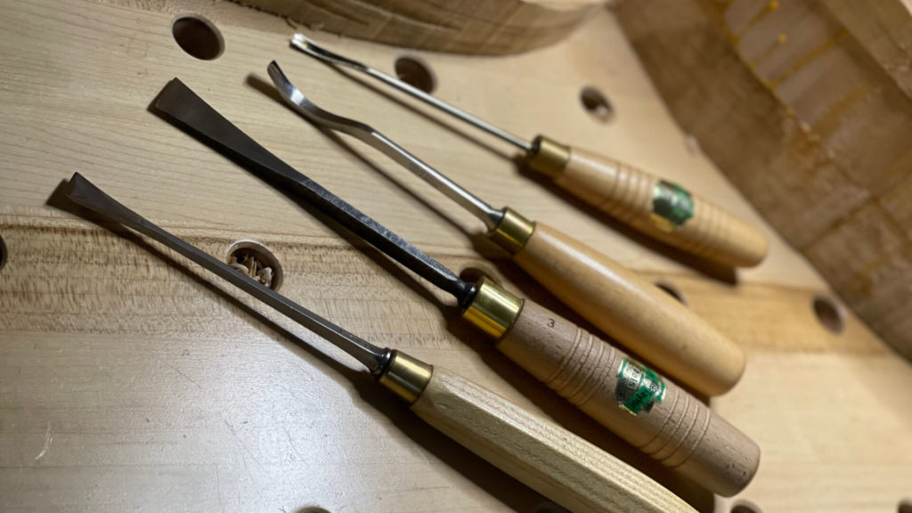 Best Wood Carving Tools for Beginners: Alexander Grabovetskiy demonstrates the best wood carving tools for beginners as he carves flowers from a block of basswood. He emphasizes the importance of using a variety of carving tools such as sharp wood carving knives and gouges of various sizes. Alexander showcases advanced techniques like chip carving to shape beautiful flowers, highlighting that each beginner should have a mallet and a beavercraft kit as essential carving supplies. He gives helpful tips for beginners on how to sharpen blades and select suitable tools for their projects. Additionally, Alexander discusses spoon carving and whittling as great starting points for those interested in decorative wooden figurines. He points out the beauty of the wood grain and texture in each piece, emphasizing the charm of his unique wood carving style. On his YouTube channel, he offers step-by-step instructions on different types of wood carving techniques to help newcomers create beautiful objects for furniture decoration or animal sculptures. This image captures Alex's woodworking journey, making it an inspiring resource for anyone eager to get started in carving.

Pfeil Carving Tools

Ashley Isles Gouges

Henry Taylor Carving Knives

Auriou Carving Tools from France