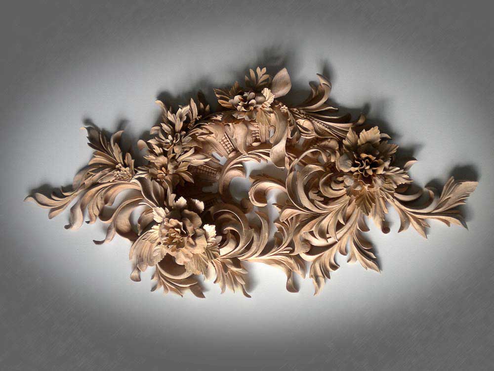 Alexander Grabovetskiy Carving. An intricate wood carving of foliage, carved from basswood by Alexander Grabovetskiy and stylized in the manner of Grinling Gibbons, a renowned master of the art of woodcarving