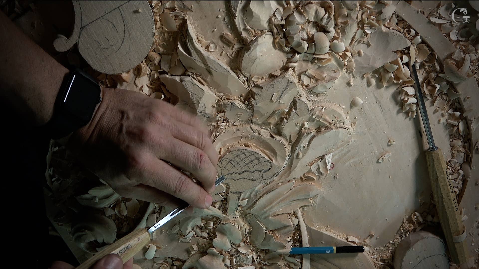 
Alexander Grabovetskiy - Woodcarver  carves flowers on a above panel of Venetian style of wood carving. This Panel goes on the top of wall panel and decorated with a lot of carved flowers and foliage and acanthus leafs as well with some Moldings in High Baroque style of 15-16th century Venice. 
 
