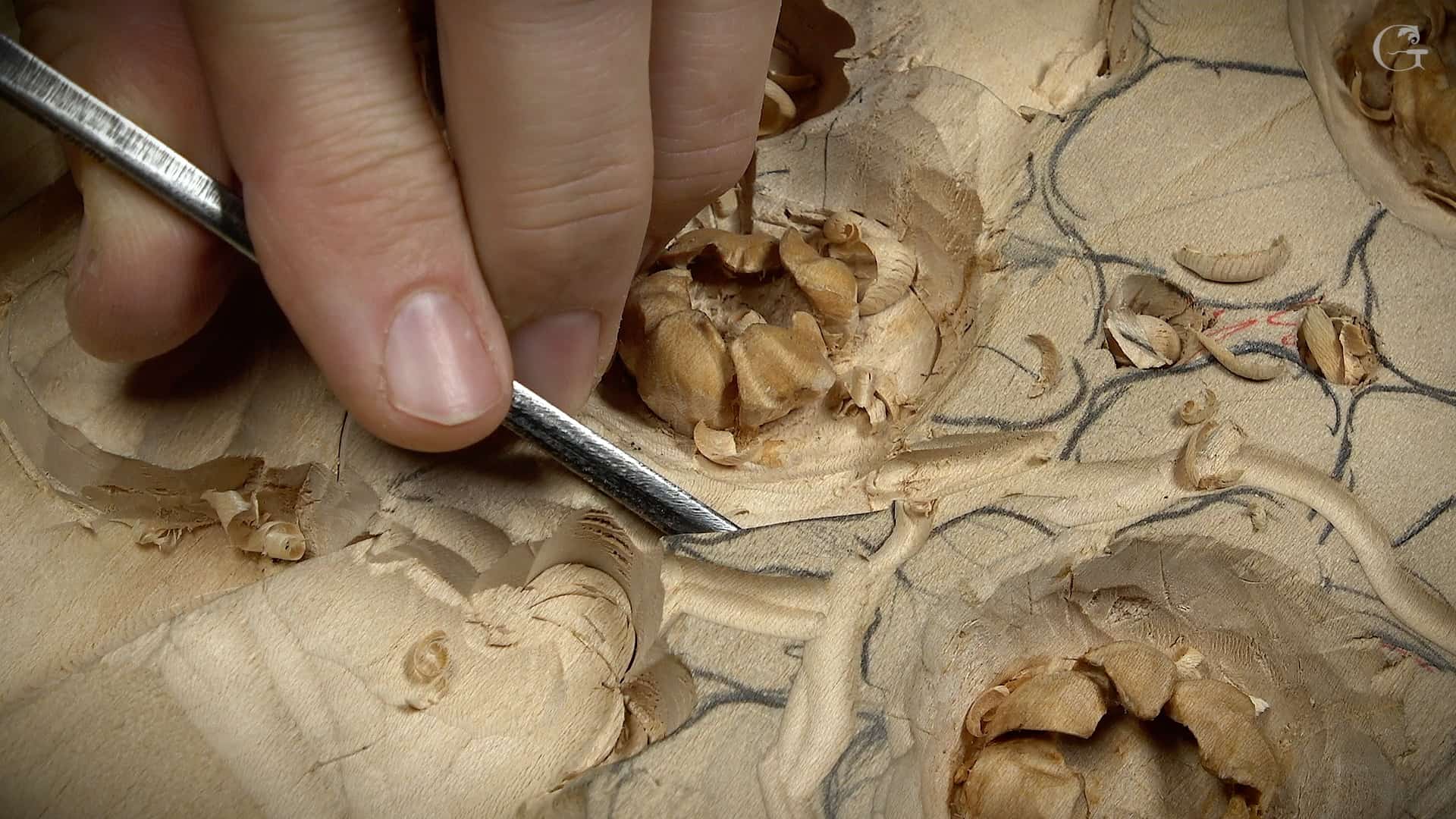 Alexander Grabovetskiy carves Venetian style flowers on a Rosette that will be applied to a wall paneling. Those wall panels are carved in Venetian  traditions of 15th-16th century High Baroque. Is it possible to make money with your hands by carving wood? Alexander does and can teach You. Learn the art of wood carving with a Wood Carving School! We offer woodcarving lessons, courses, masterclass, workshops, classes, and videos to help you make money carving wood. Our professional instructors provide expertise and guidance so you can hone your skill and create beautiful pieces. Explore our offerings and start your carving journey today!