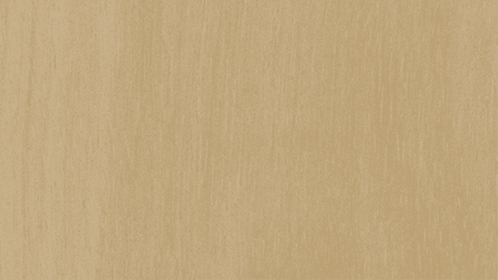 WOODCARVING LESSONS: A close-up look at light brown wood with a gentle grain pattern. The only person in the pictures is Woodcarver Grabovetskiy. This image is great for woodcarving lessons, tutorials, or courses. - Wood Carving tutorials