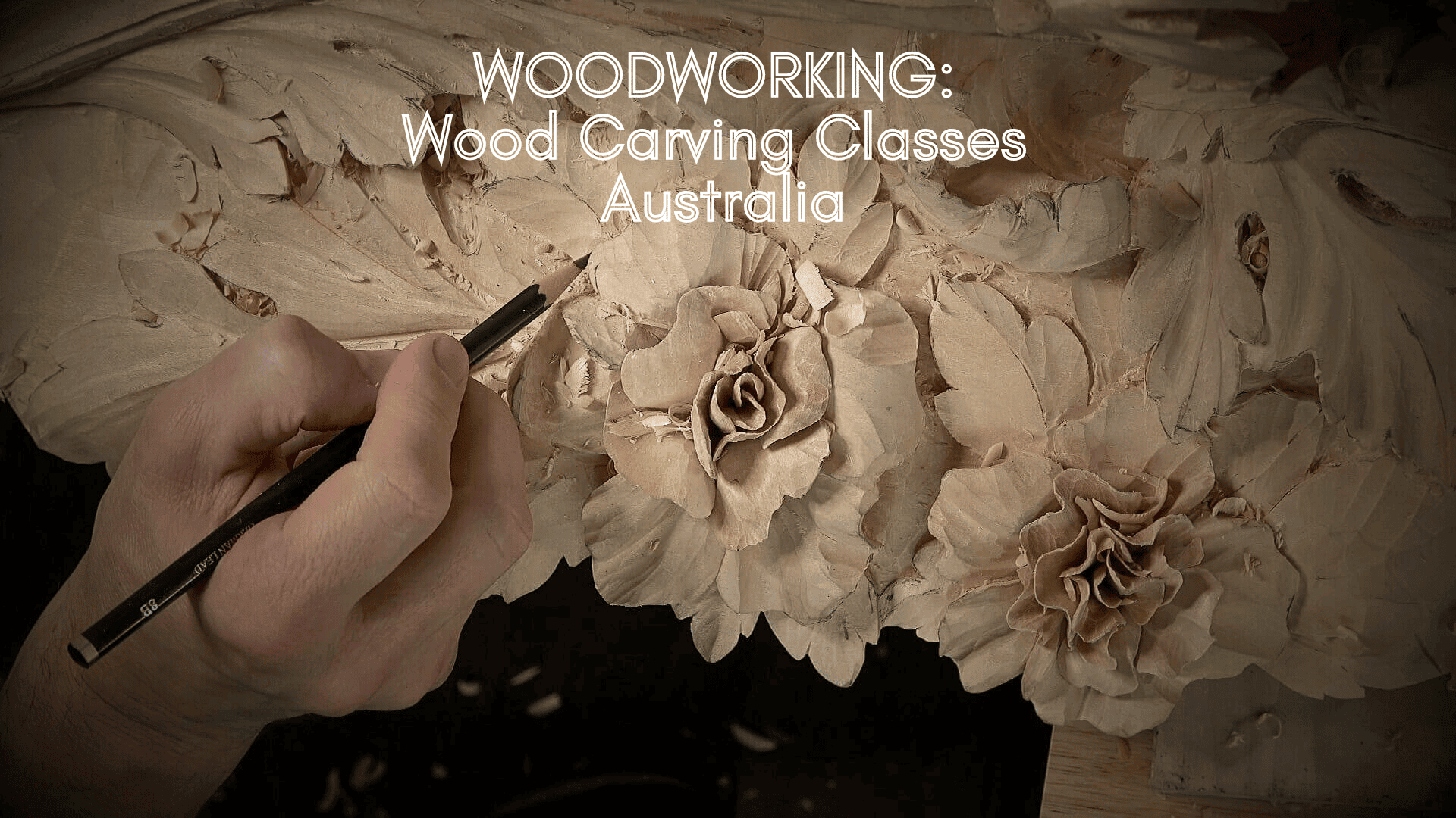 A close-up of a hand skillfully carving detailed floral designs into wood. This image emphasizes the art of wood carving, showcasing techniques used in wood carving classes and lessons in Australia. The focus is on precision and creativity in woodworking.