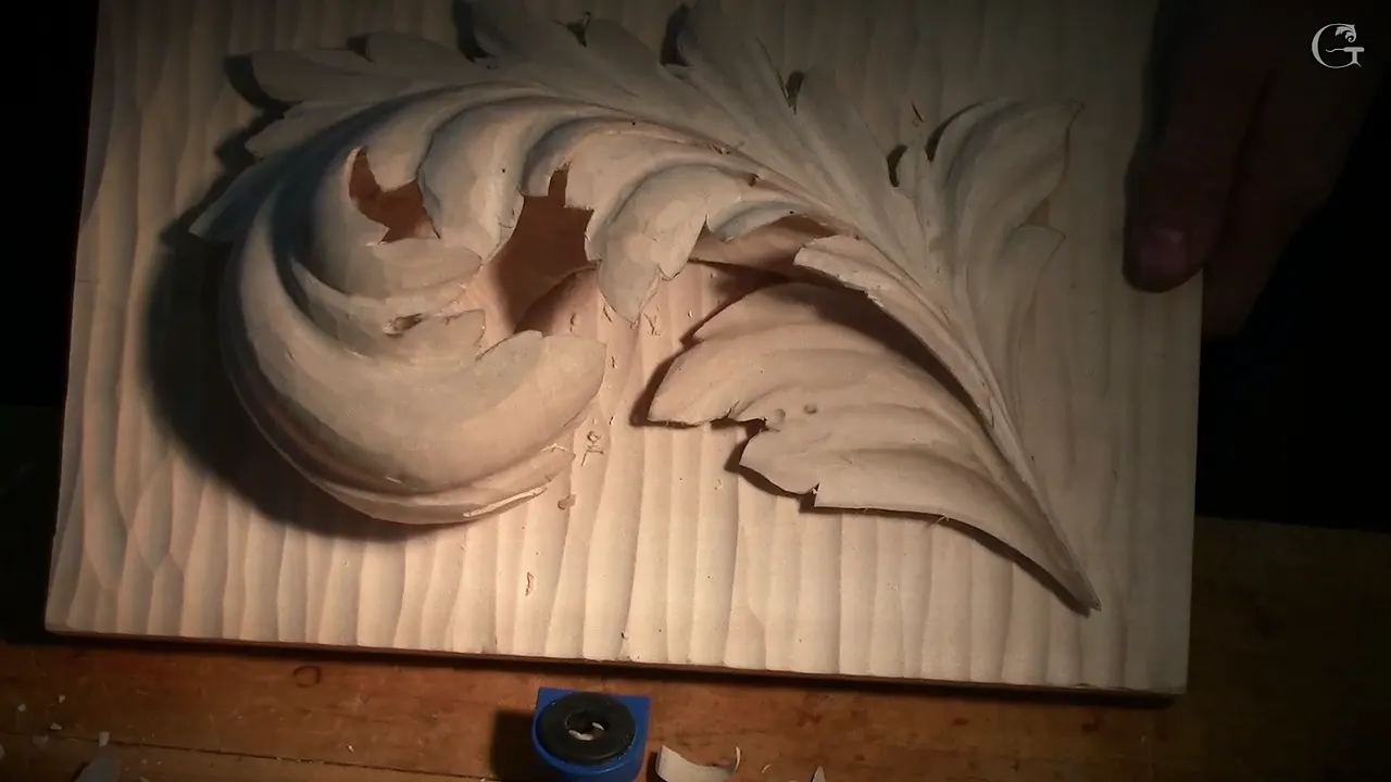 Finished Byzantine leaf mounted on its hand textured board, pierced eyes throwing hard shadow with every pipe standing up.