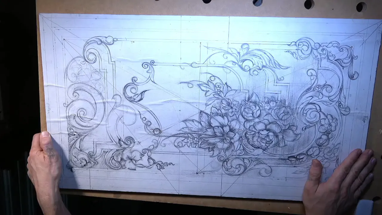 Whole walnut panel seen at once, the drawn acanthus and flowers filling it from top to bottom.