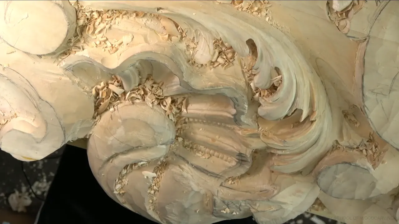 Top view of the carved shell and acanthus section, chips still lying in the hollows.