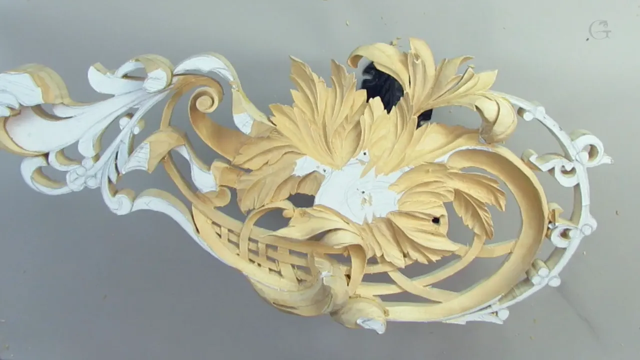 Pierced hashemi panel at workshop twelve, paper pattern still white where nothing has been carved.