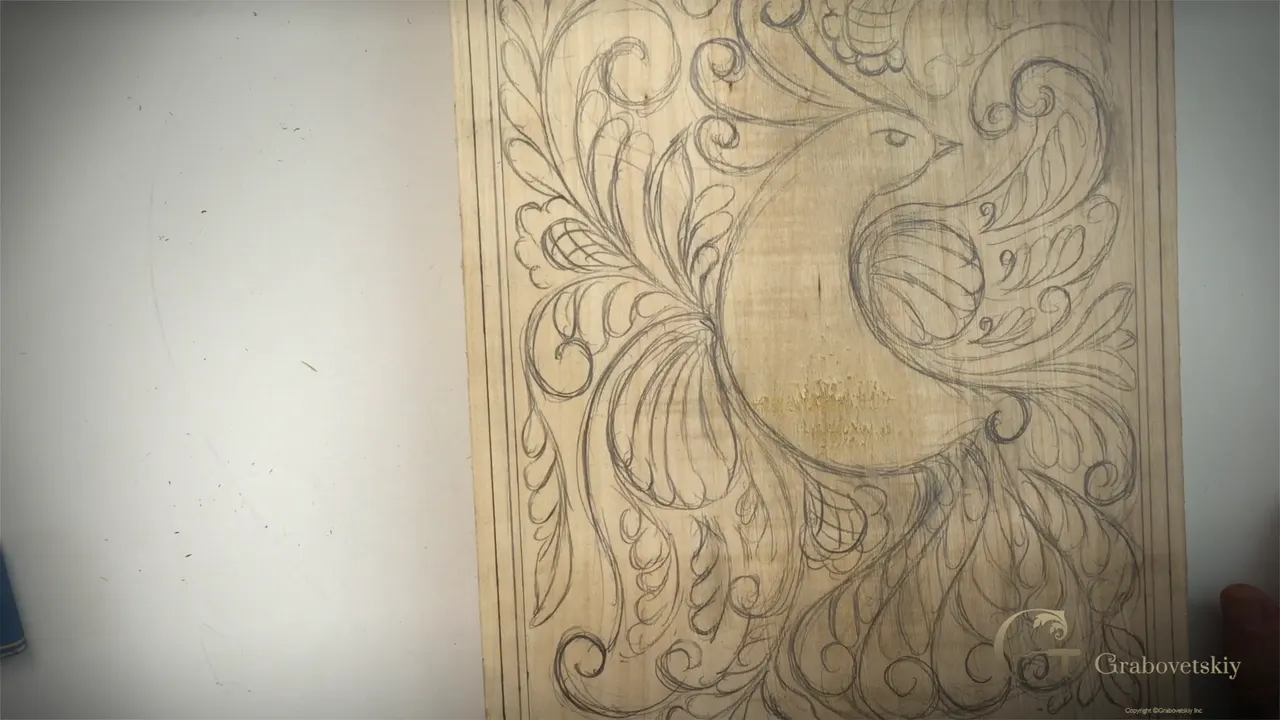 Finished pencil drawing of a stylized bird of paradise filling a basswood board.