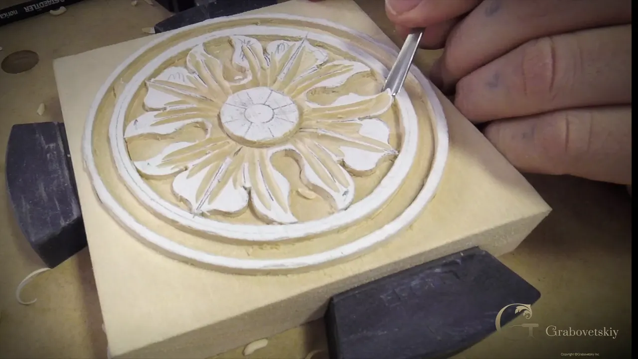 The rosette with every leaf hollowed inward and its outer rim left standing high