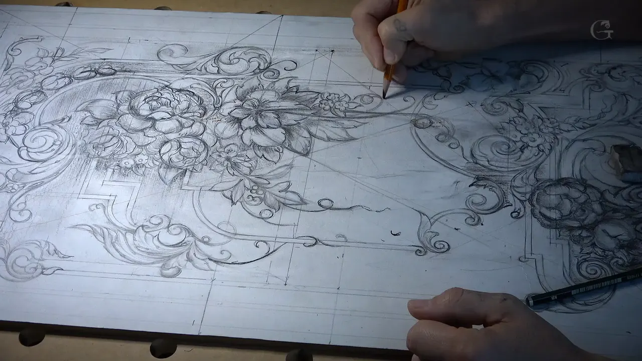 Full length of the panel drawing on the bench, both hands working at the top edge