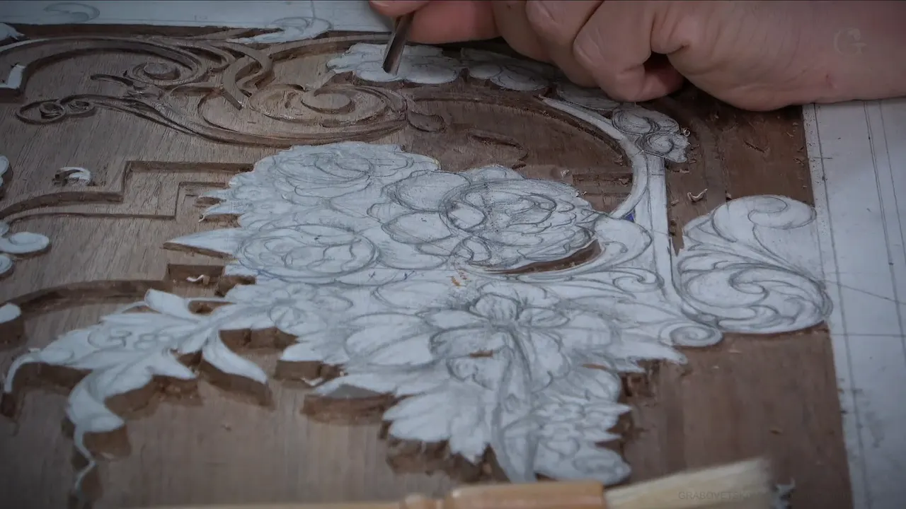 Fine tool at the top of the board while the whole bouquet waits below it, still only drawn on paper