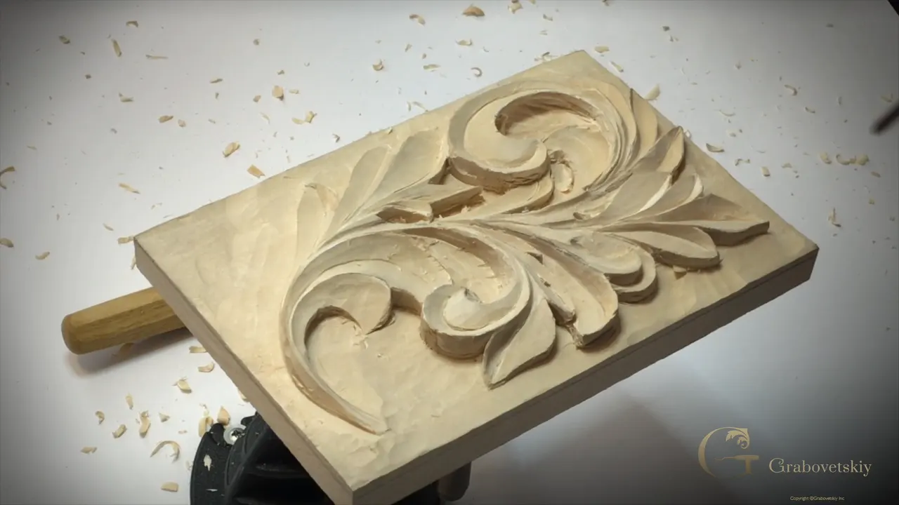 Deep shade under every leaf edge, with one handle resting on the bench at the left