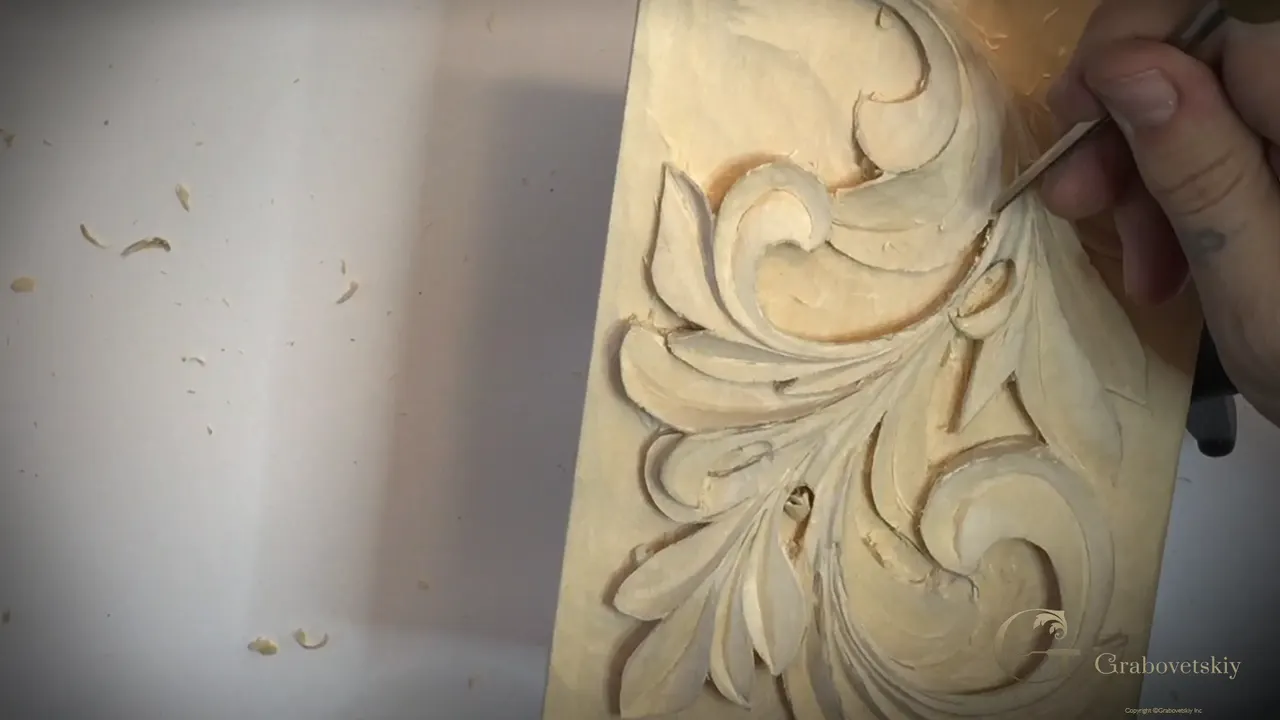 Thin blade reaching in at the top of the panel