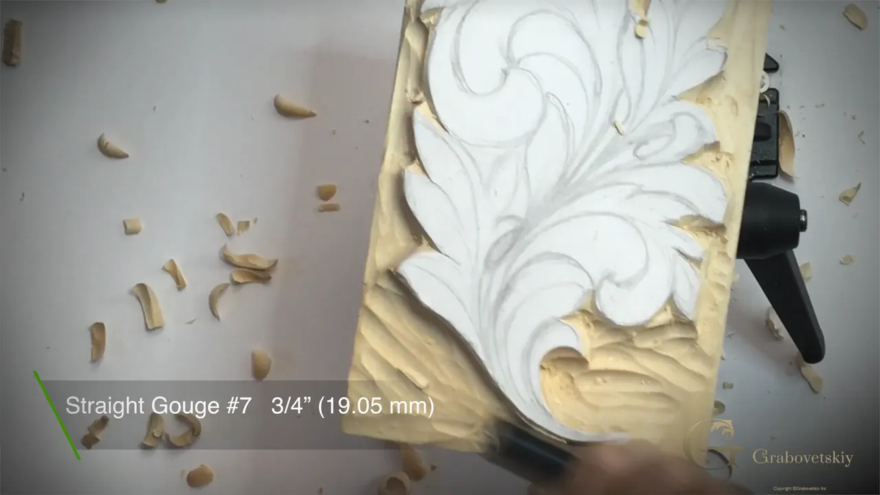 Panel with the ground taken down, captioned on screen as a straight gouge number 7 at three quarters of an inch