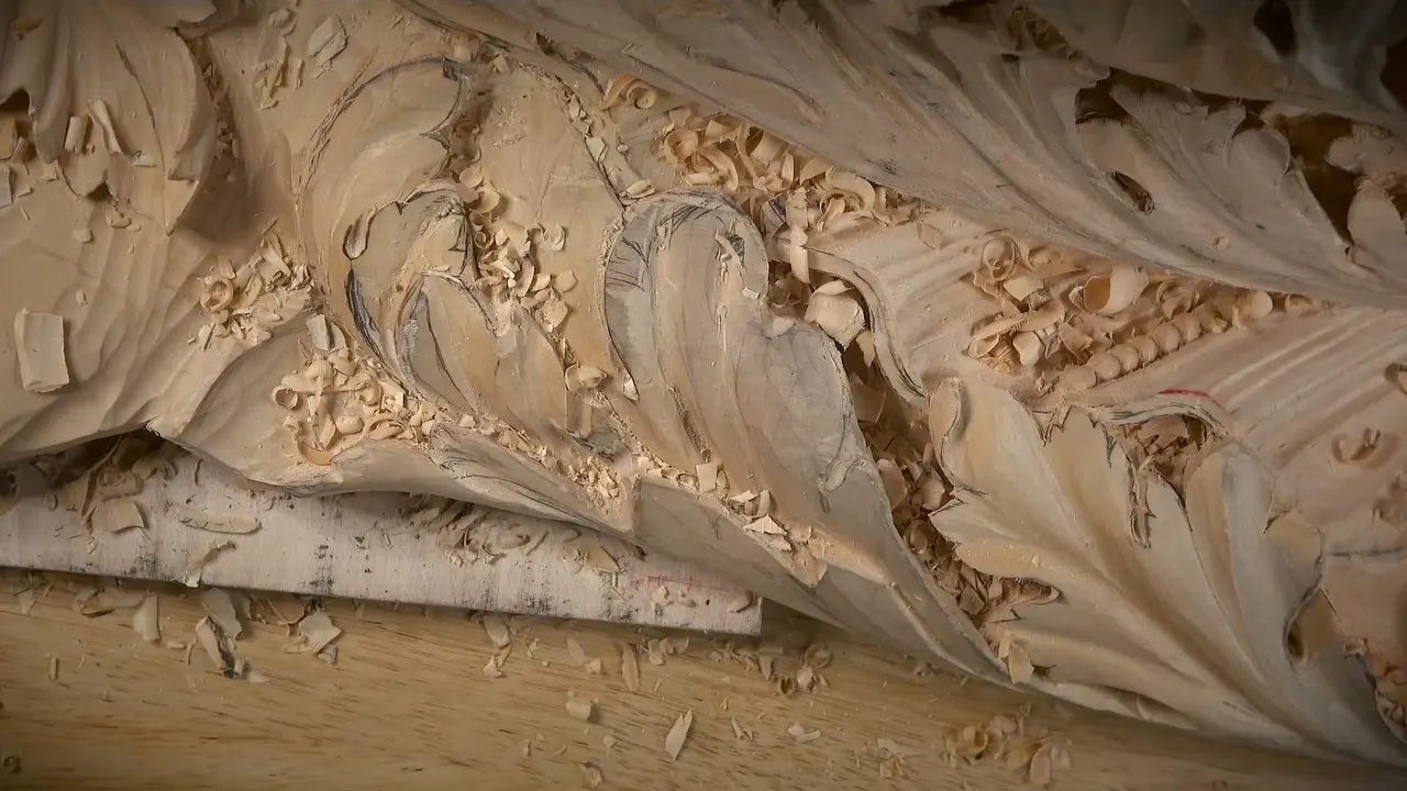 Acanthus leaves on the Venice Room panel, chips lying in the hollows