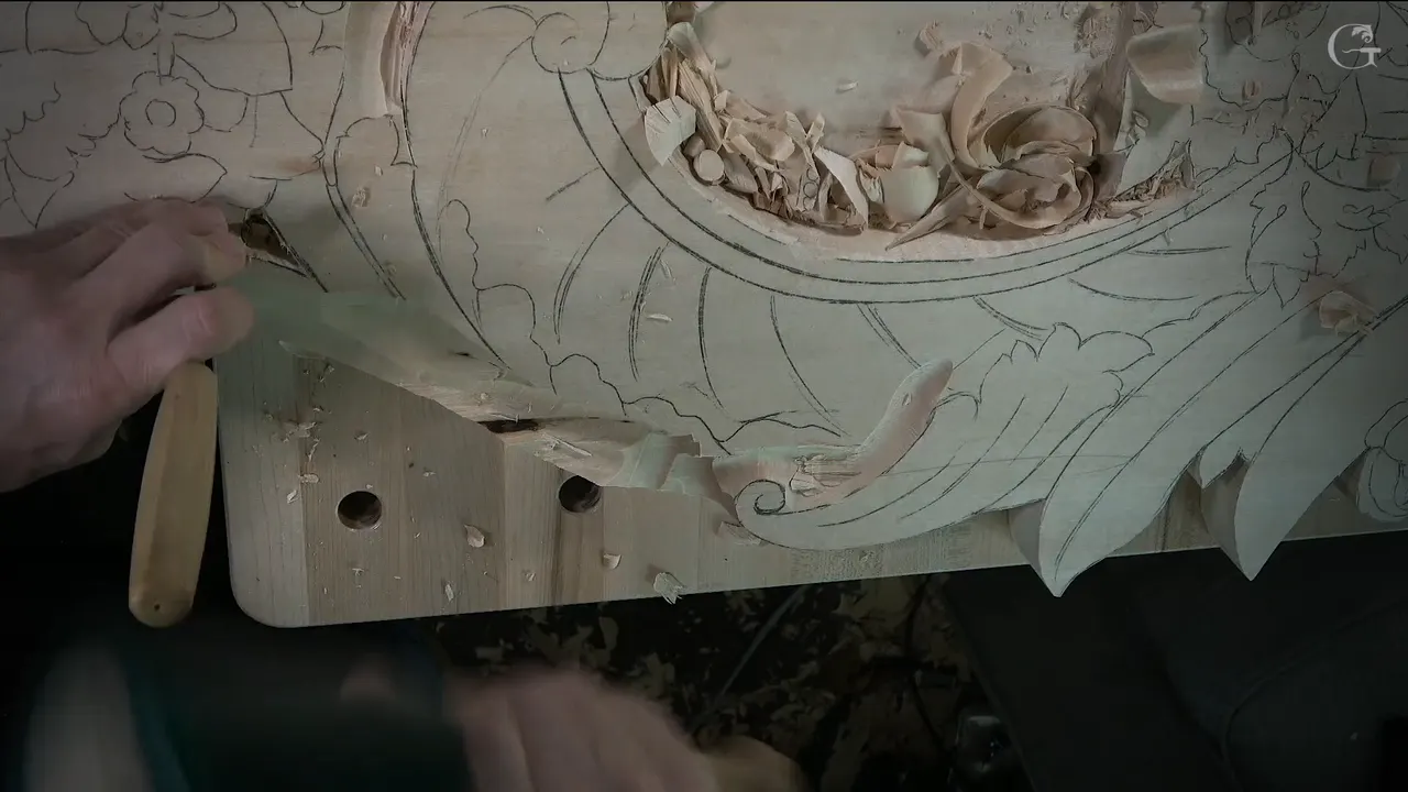 Small veiner pinched close to its edge, working along the pencil line