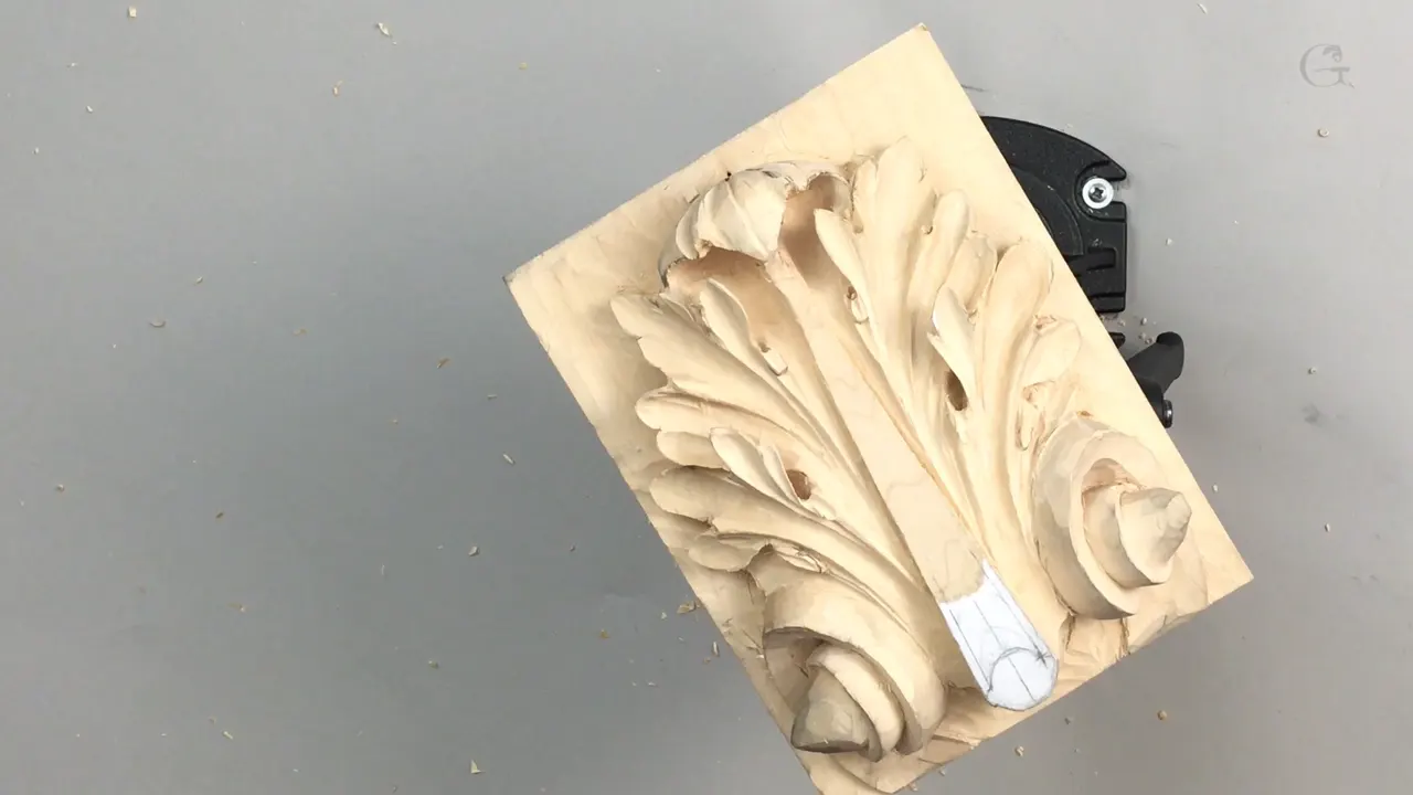 Panel lying flat on the bench with a pale marker across its base and nobody touching it