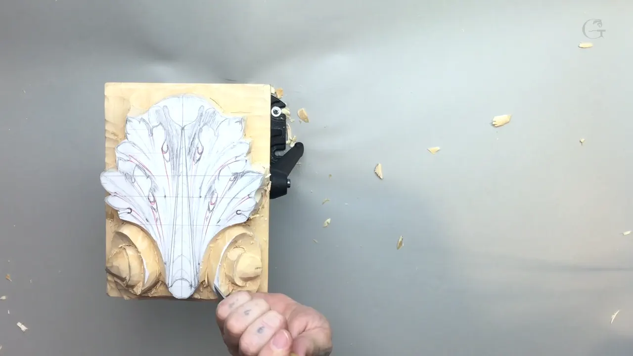 Whole panel upright on the vise with the paper drawing still sitting on the high surfaces